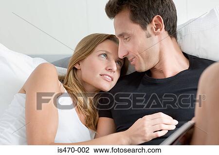 Relaxed couple View Large Photo Image Stock Image - Relaxed couple. Fotosearch