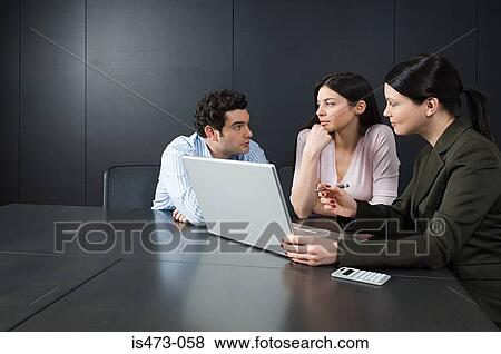Stock Photo - Bank manager helping couple. Fotosearch