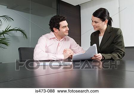 Bank manager helping customer View Large Photo Image Stock Photo - Bank manager helping customer. Fotosearch