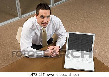 Stock Photo - Bank manager with laptop. Fotosearch