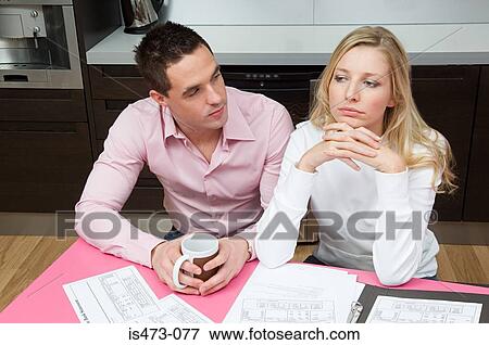 Man looking at fed up woman View Large Photo Image Stock Photo - Man looking at fed up woman. Fotosearch