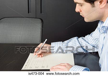 Picture - Man signing will. Fotosearch