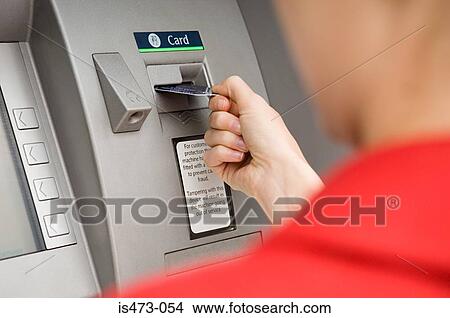 Person using cash machine View Large Photo Image Picture - Person using cash machine. Fotosearch