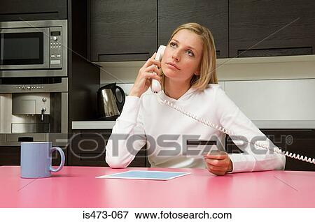 Woman telephone banking View Large Photo Image Stock Photo - Woman telephone banking. Fotosearch