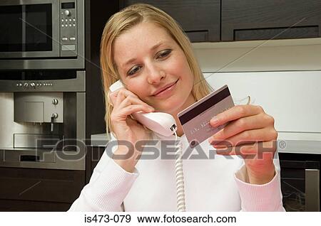 Woman telephone banking View Large Photo Image Stock Photo - Woman telephone banking. Fotosearch