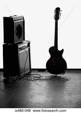 Amplifier and electric guitar View Large Photo Image Stock Photo - Amplifier and electric guitar. Fotosearch