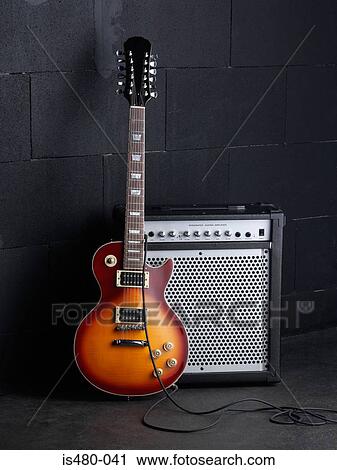 Stock Image - Electric guitar and amplifier. Fotosearch