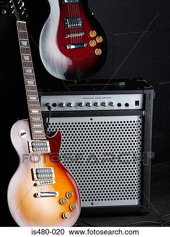 Electric guitars and amplifier View Large Photo Image Stock Image - Electric guitars and amplifier. Fotosearch