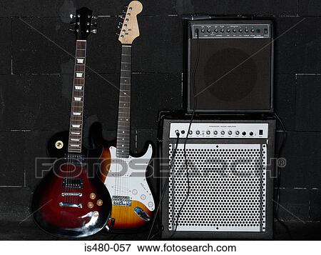 Electric guitars and amplifiers View Large Photo Image Stock Photo - Electric guitars and amplifiers. Fotosearch