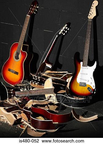 Guitars and smashed guitars View Large Photo Image Stock Image - Guitars and smashed guitars. Fotosearch