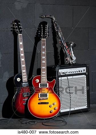 Stock Photo - Musical instruments and amplifier. Fotosearch
