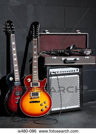 Musical instruments and amplifier View Large Photo Image Stock Photograph - Musical instruments and amplifier. Fotosearch