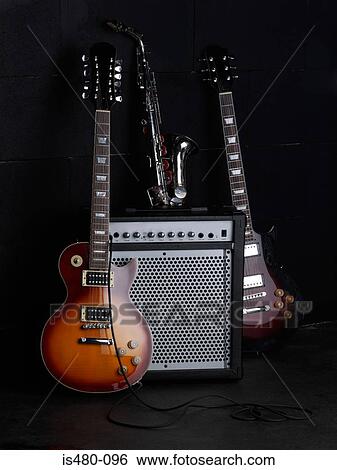 Musical instruments and amplifier View Large Photo Image Stock Photograph - Musical instruments and amplifier. Fotosearch