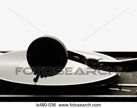 Record on turntable View Large Photo Image Stock Photograph - Record on turntable. Fotosearch