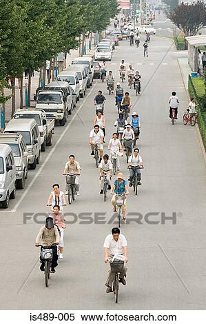 Chinese people cycling View Large Photo Image Stock Photography - Chinese people cycling. Fotosearch
