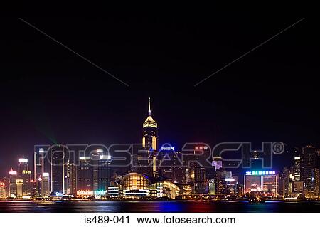Stock Image - Hong kong skyline at night. Fotosearch