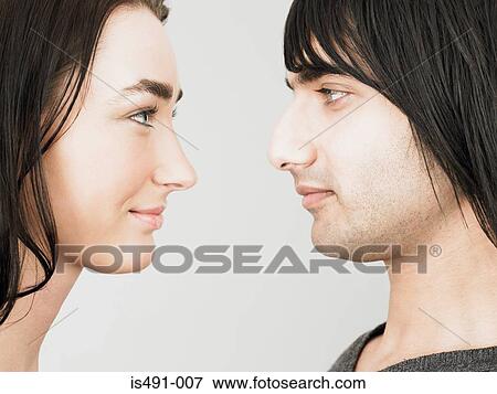Stock Photo - Couple face to face. Fotosearch