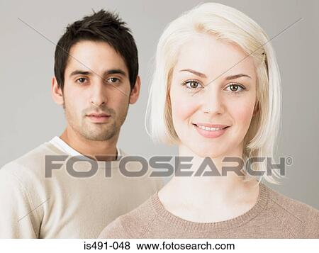 Young man and young woman View Large Photo Image Stock Photo - Young man and young woman. Fotosearch