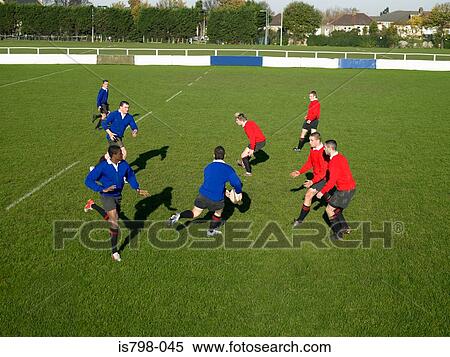 Men playing rugby View Large Photo Image Stock Photography - Men playing rugby. Fotosearch