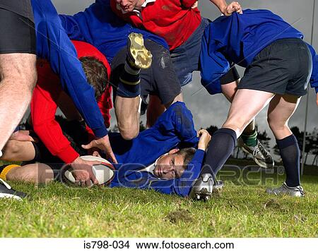 Playing rugby View Large Photo Image Picture - Playing rugby. Fotosearch