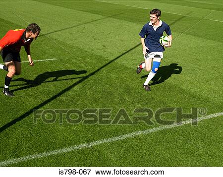 Playing rugby player View Large Photo Image Stock Photo - Playing rugby player. Fotosearch
