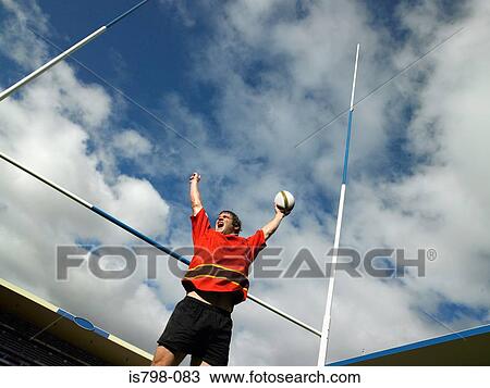 Stock Image - Rugby player celebrating. Fotosearch
