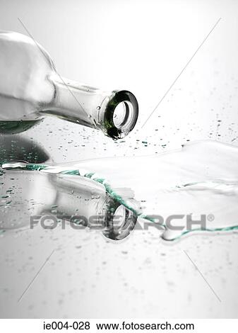 Bottle and spilled water View Large Photo Image Stock Photo - Bottle and spilled water. Fotosearch