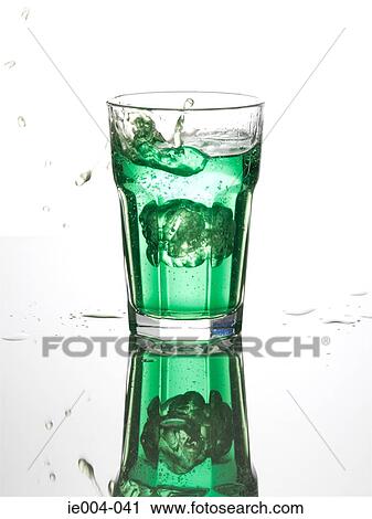 Ice cubes dropping into drink View Large Photo Image Stock Image - Ice cubes dropping into drink. Fotosearch