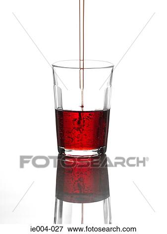 Pouring drink into glass View Large Photo Image Stock Photo - Pouring drink into glass. Fotosearch