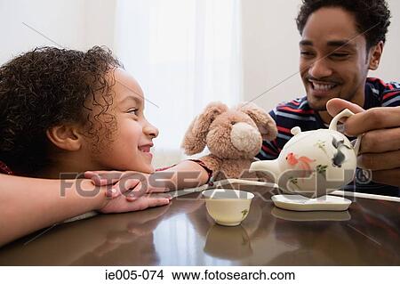 Father and daughter playing View Large Photo Image Picture - Father and daughter playing. Fotosearch