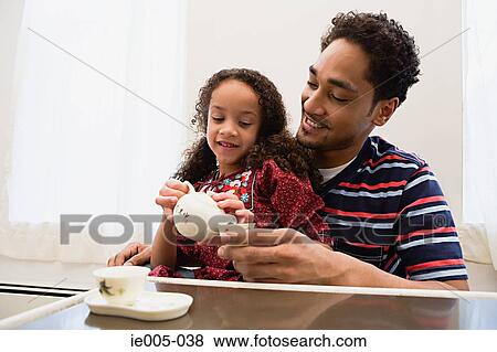 Father and daughter playing View Large Photo Image Stock Photo - Father and daughter playing. Fotosearch
