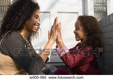 Mother and daughter playing View Large Photo Image Stock Photography - Mother and daughter playing. Fotosearch