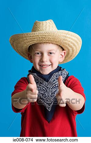 Boy dressed as cowboy View Large Photo Image Picture - Boy dressed as cowboy. Fotosearch