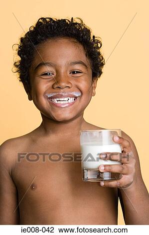 Boy with milk View Large Photo Image Stock Image - Boy with milk. Fotosearch