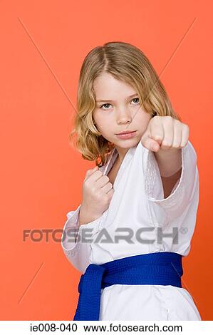 Girl doing martial arts View Large Photo Image Stock Image - Girl doing martial arts. Fotosearch