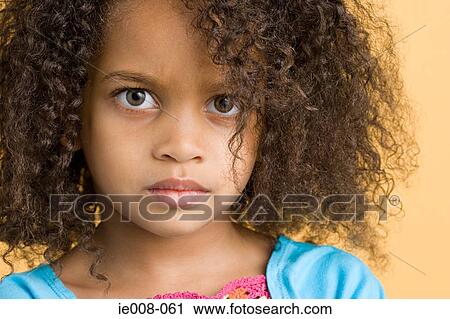 Stock Image - Girl looking sullen. Fotosearch