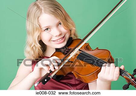 Stock Image - Girl playing violin. Fotosearch