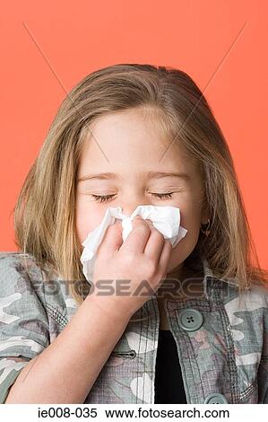 Girl sneezing View Large Photo Image Stock Photography - Girl sneezing. Fotosearch