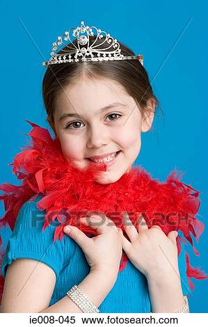 Stock Photography - Girl with tiara and feather boa. Fotosearch