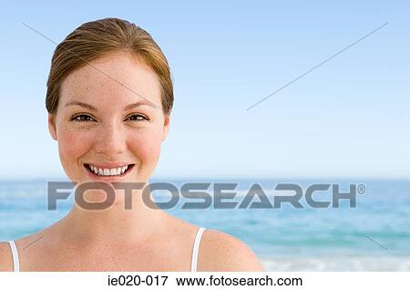 Stock Photo - Portrait of a young woman. Fotosearch