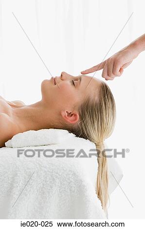 Young woman having alternative medicine View Large Photo Image Stock Photography - Young woman having alternative medicine. Fotosearch