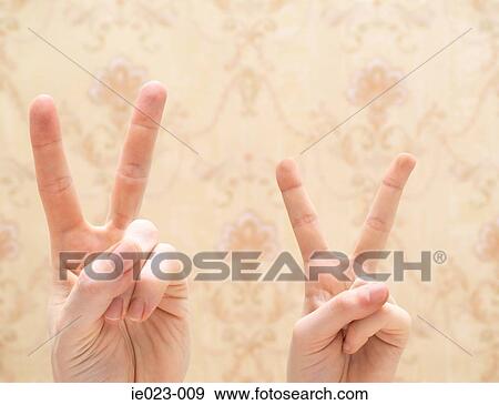 Adult and child doing peace signs View Large Photo Image Stock Photo - Adult and child doing peace signs. Fotosearch