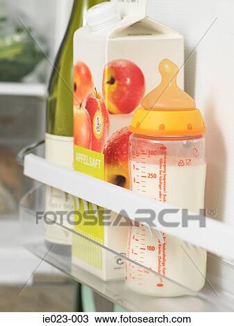Baby bottle in refrigerator View Large Photo Image Stock Image - Baby bottle in refrigerator. Fotosearch