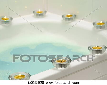 Stock Photo - Candles on bathtub. Fotosearch