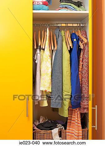 Clothes in a closet Stock Image | ie023-040 | Fotosearch