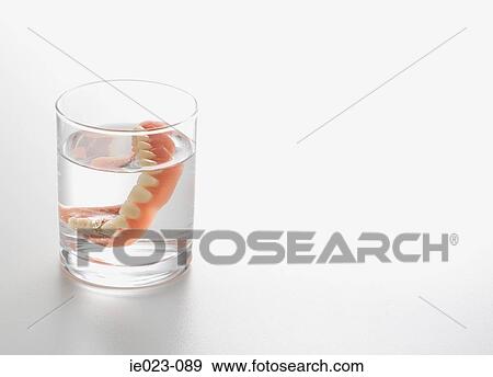 Dentures in water View Large Photo Image Stock Photo - Dentures in water. Fotosearch