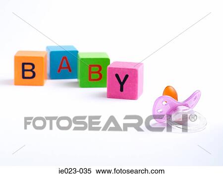 Dummy and building blocks spelling baby View Large Photo Image Stock Photography - Dummy and building blocks spelling baby. Fotosearch