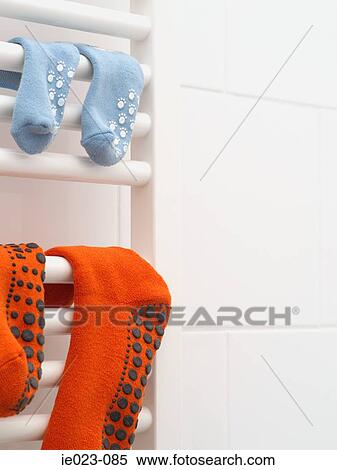 Socks on a radiator View Large Photo Image Stock Photography - Socks on a radiator. Fotosearch