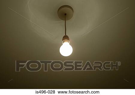 Stock Photo - Illuminated lightbulb. Fotosearch