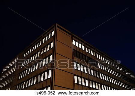 Stock Image - Office building at night. Fotosearch